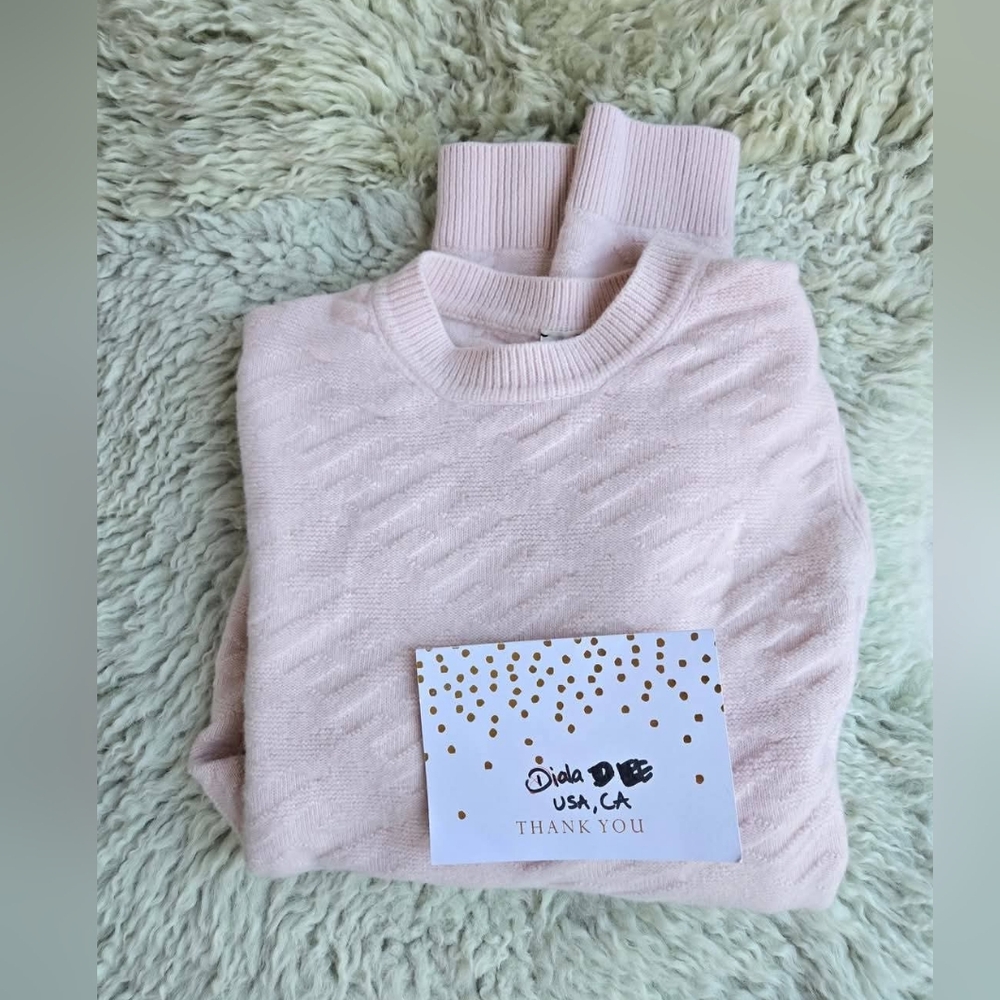Hermès Light Pink Sweater.